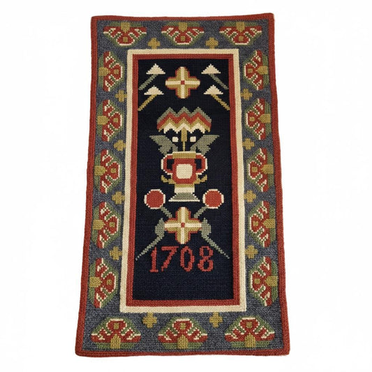 Handwoven Swedish rölakan-style wool wall hanging with folk motifs and woven date 1708