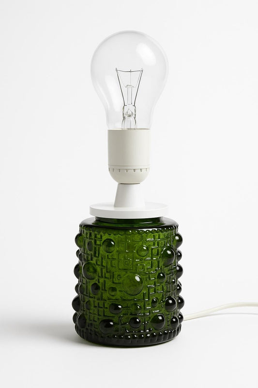 Mid-Century Modern Art Glass Table Lamp – Fåglavik, Sweden, 1970s with green textured glass base and clear bulb.