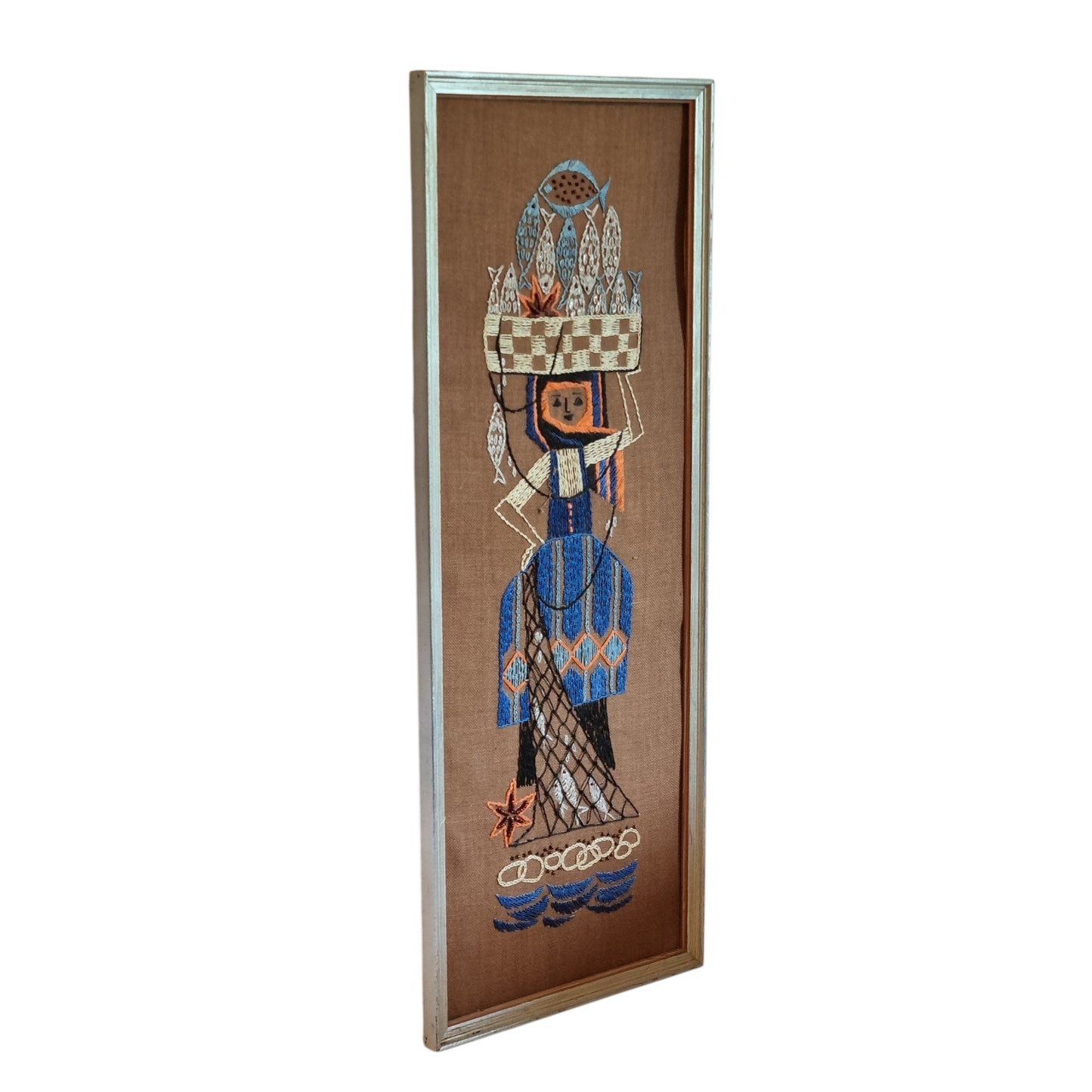 Vintage Scandinavian hand-embroidered fisherwoman textile wall art, silver aluminium frame, 60x23 cm, Sweden